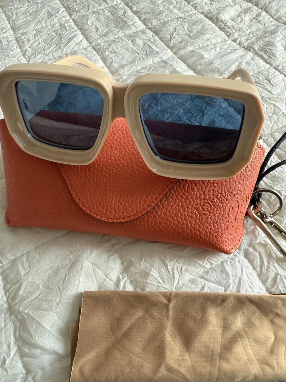 Loewe Beige Frame Sunglasses with Blue Tint and Orange Case
